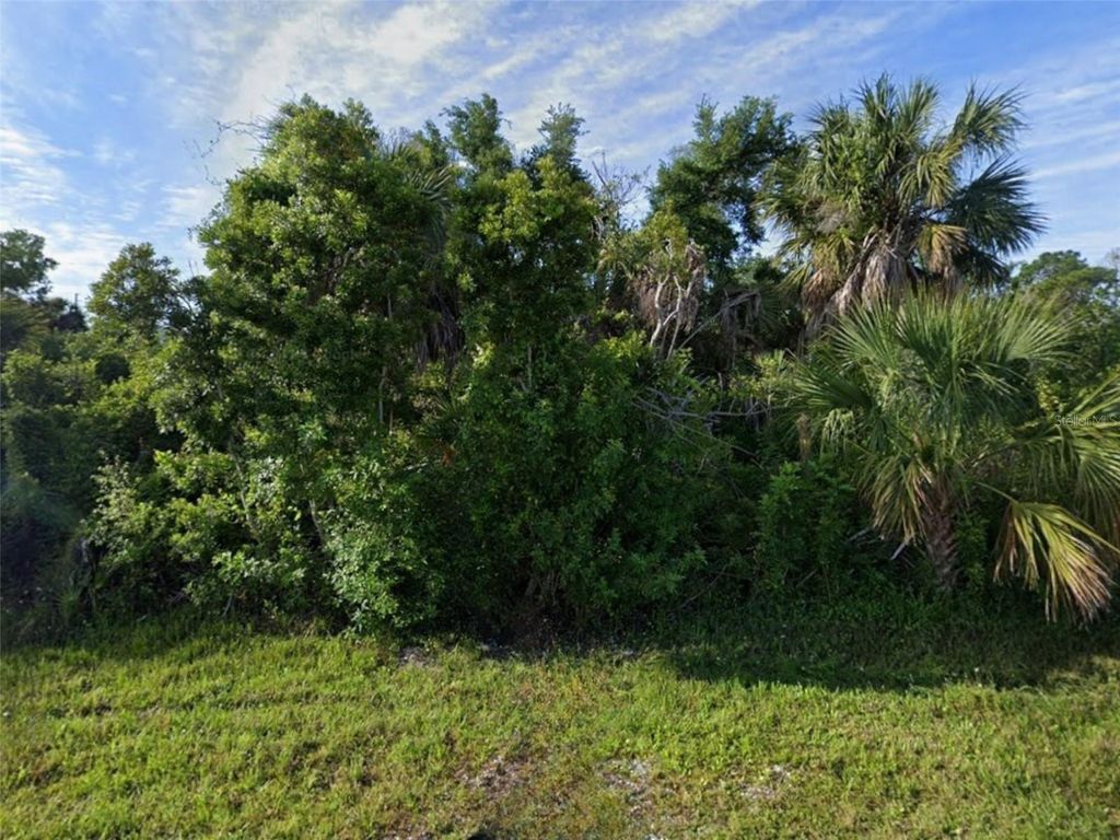 Photo of 10185 Atlantic Avenue, Englewood, FL 34224 (MLS # D6146495)