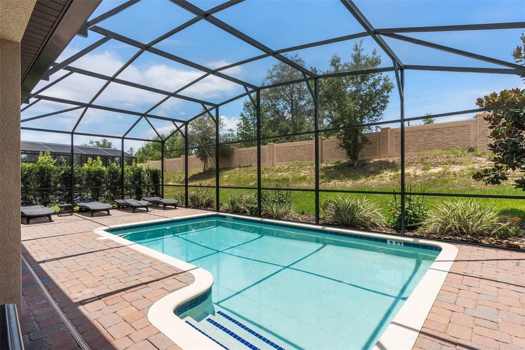 Photo of 1476 Moon Valley Drive, Davenport, FL 33896 (MLS # FC317023)