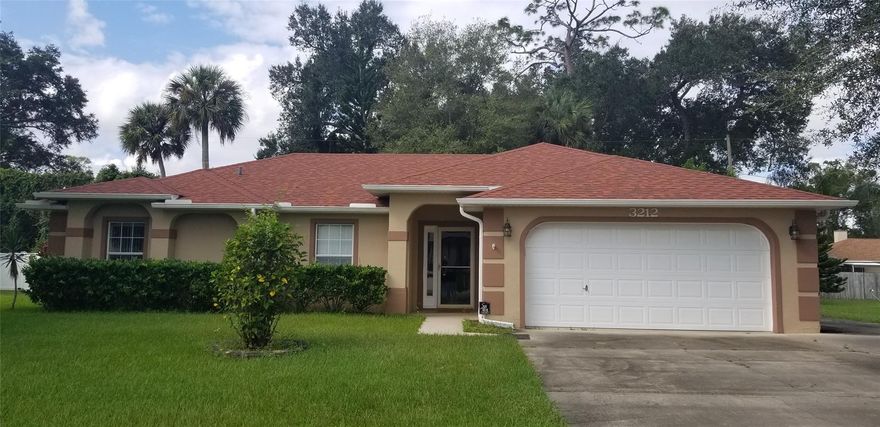 Well maintained Block construction home built in 2004 on a 120'x125' property.  New Roof installed with architectural shingles in 2017, A/C replaced in 2016. Updated kitchen in 2016, with laminate flooring. Kithchen has an eat in breakfast nook. New carpet installed in living room and bedrooms. Lots of interior living space including large enclosed Florida room overlooking beautiful large back yard. This home is move in ready!
Close to shopping, schools and Whistle Stop Park. ;Water: City