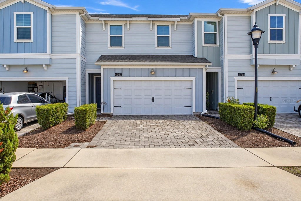 Photo of 4767 Tribute Trail, Kissimmee, FL 34746 (MLS # O6449724)