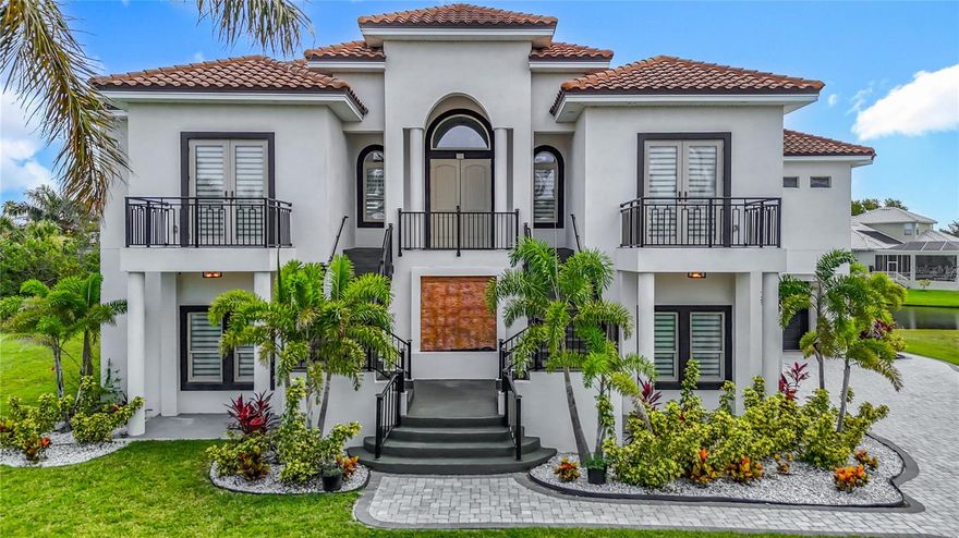 Step into elegance and coastal sophistication with this custom-built Mediterranean masterpiece, located in the prestigious 24-hour gated waterfront community of Andalucia, nestled on a private peninsula in Tampa Bay.
This block-constructed residence offers nearly 5,000 sq ft of heated living space and over 8,200 total sq ft, thoughtfully designed for style, comfort, and function. With 4 spacious bedrooms, 3 full bathrooms, and 2 half baths, every corner of this home delivers luxury living at its finest.
From the moment you arrive, you'll be greeted by a grand entryway with majestic dual staircases and a custom 8x8 ft fountain, setting the tone for what’s inside. Soaring 15-foot cathedral ceilings and wood-look porcelain tile floors create a breathtaking ambiance throughout the open-concept main level.
The gourmet kitchen is a chef’s dream, featuring quartz countertops with waterfall edges, real wood cabinetry, high-end stainless steel appliances, and a gas cooktop. The expansive living area seamlessly flows onto a covered balcony with stunning water views, the perfect setting for entertaining or relaxing.
But the true sanctuary of this home is the luxurious primary suite. Exceptionally spacious and filled with natural light, the room opens up to the main balcony through custom 90-degree pocket sliding doors, offering front-row seats to the sunset. Enjoy the comfort of motorized blackout shades, and escape to your own retreat with a fully customized walk-in closet that’s as stylish as it is functional. The en-suite bathroom feels like a spa, featuring a freestanding soaking tub, 15x4 ft walk-in shower with a 40-inch rain head, dual vanities, and backlit smart mirrors for the perfect glow.
On the lower level, discover multiple bonus rooms ideal for a game room, gym, or media lounge plus a flexible office space with its own private entrance, perfect for working from home or transforming into an epic man cave.
Car lovers will be thrilled with the oversized 3-car garage with finished flooring, easily fitting up to 5 vehicles depending on size.
Love the outdoors? There’s ample room to build your dream pool, and from the second-level terraces, you’ll enjoy sunrise views from one side and sunsets from the other... a true Florida dream.
As a resident of Andalucia, you’ll enjoy access to resort-style amenities including a private marina (slips for rent or purchase), clubhouse, community pool, tennis courts, playground, and a scenic fishing pier overlooking Tampa Bay.