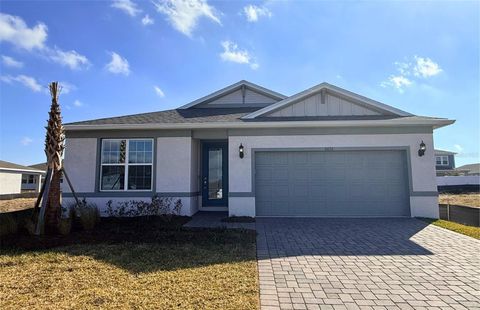 Photo of 5676 Flame Vine Way, Saint Cloud, FL 34771 (MLS # O6351602)