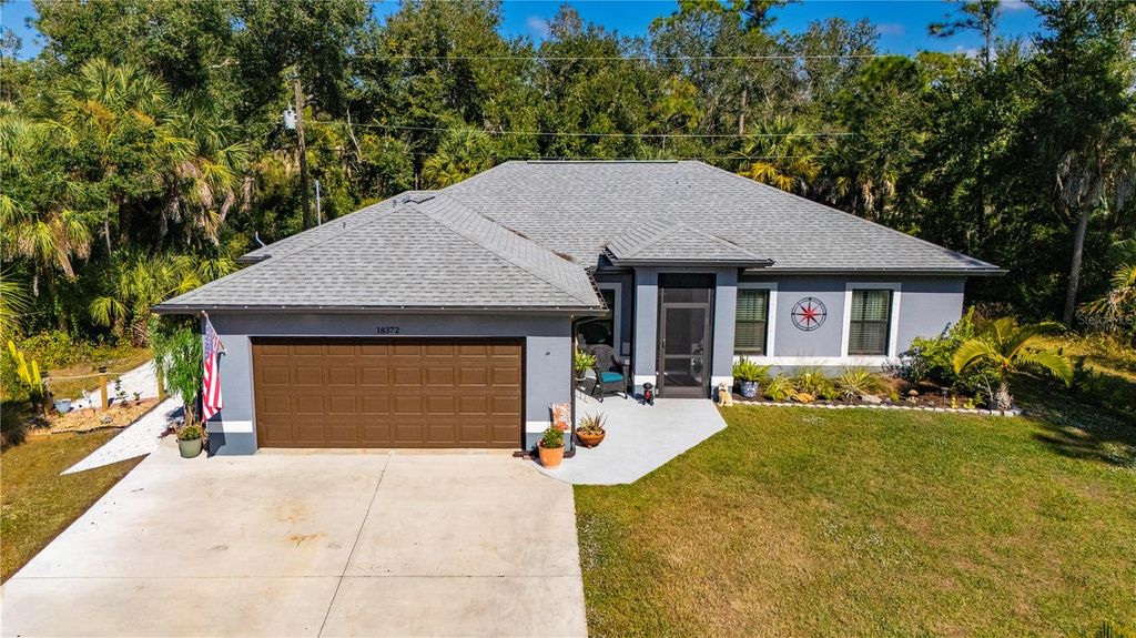 Photo of 18372 Moonshadow Avenue, Port Charlotte, FL 33954 (MLS # C7518387)