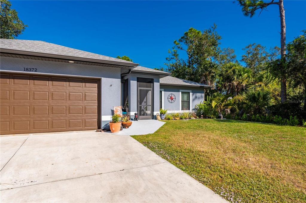 Photo of 18372 Moonshadow Avenue, Port Charlotte, FL 33954 (MLS # C7518387)