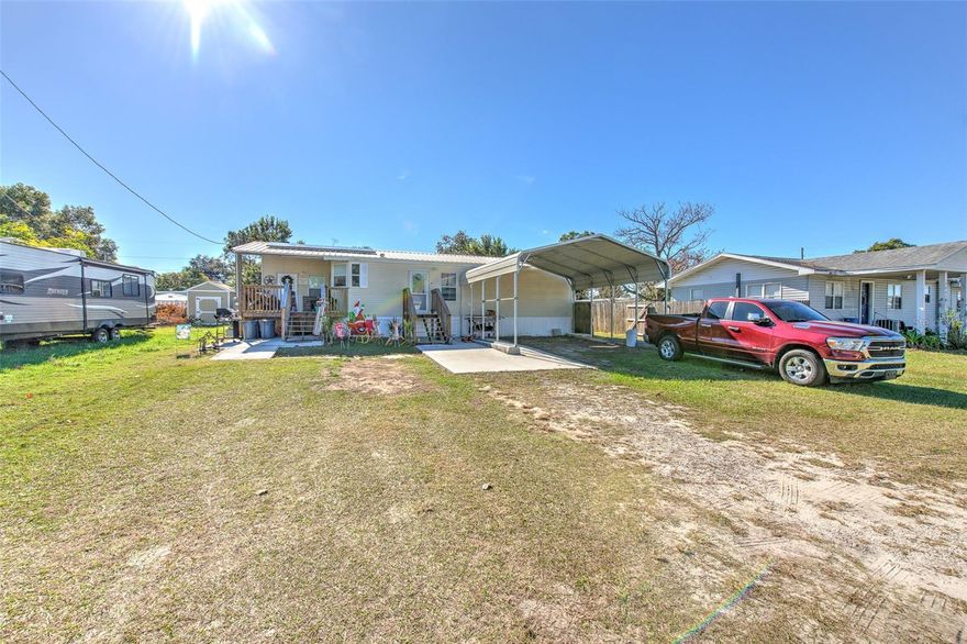 Charming 3-Bedroom, 2-Bath Home on a .22-Acre Lot 
This inviting home features an open floor plan with an island kitchen that flows seamlessly into the living and dining areas—perfect for entertaining friends and family. Enjoy covered parking, a fully fenced backyard, and ample storage with a large 20x24 shed/workshop plus an additional storage shed. A durable metal roof was installed in 2019, adding long-term value and peace of mind.
Conveniently located close to shopping with an easy commute to Lakeland, Orlando, Tampa and Dade City.