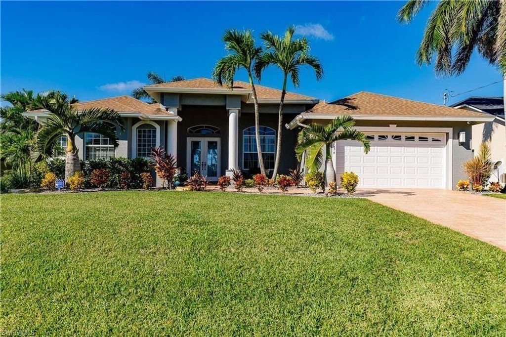 Photo of 3034 SW 28th Avenue, Cape Coral, FL 33914 (MLS # C7517944)