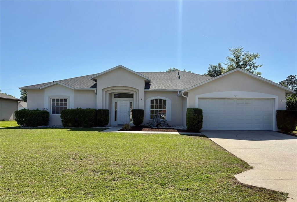Photo of 24 Pepperdine Drive, Palm Coast, FL 32164 (MLS # FC317737)
