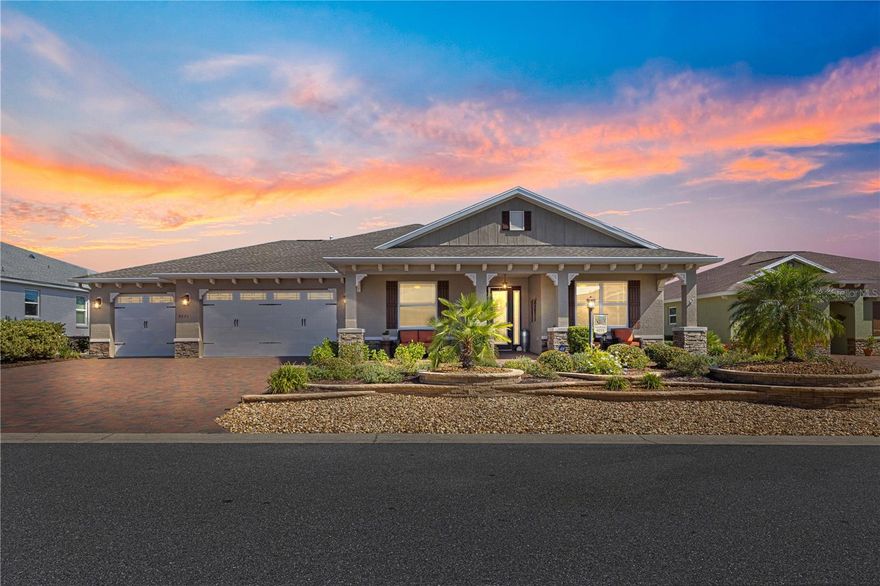 Want an elegant home on a PRIVATE home site? Congratulations...you've found it!!! This home truly shows like a model, with stunning landscaping and unbeatable curb appeal that welcome you to an inviting front porch. Step inside the leaded-glass front door and be greeted by tall ceilings with tray accents and elegant crown molding throughout. The living room is a cozy retreat featuring an electric fireplace beautifully encased in stone. The gourmet kitchen is a chef’s dream, boasting quartz countertops, stainless steel appliances including a built-in double oven, gas cooktop, and staggered cabinets with crown molding. Perfect for hosting guests, the secondary bedroom offers a private en-suite, ideal as a guest retreat or in-law suite. The large owner’s suite impresses with a walk-in closet featuring built-in cabinets and a luxurious walk-in shower. Additional conveniences include a large laundry room with extra cabinets and counters, and the washer and dryer are included in the sale. Energy efficiency is a priority, with added insulation in the attic, insulated garage doors, a thermostatic attic fan, and a whole home 16KW Generac generator for peace of mind. For hobbyists and handymen, the epoxy-coated garage features a spacious air-conditioned workshop—a perfect space for projects year-round. Exterior paint got a fresh coat recently.  Outdoor living is exceptional in this home with a huge, wrap-around screened-in lanai and a brick-paved patio, complete with added lights in the rear soffits for evening ambiance. The gas fire-pit and gas line for a grill add to the convenience and enjoyment of your backyard. Best of all...there are no homes behind you! This is more than a home; it’s a lifestyle. Don’t miss your chance to live in this beautifully maintained, move-in-ready home that is a masterpiece!