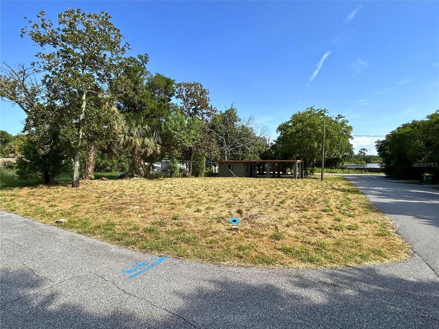 PRICE IMPROVEMENT — LAND WITH CONCRETE STRUCTURES IN PLACE

A lot that’s ready to work with is hard to find.
This one gives you a cleared, level site with a concrete block carport and a covered utility/storage room already built.
That alone makes the next step easier.

Water & Electric available, needs updated septic. 

No HOA and no lot rent, which keeps ownership simple.

The location adds another advantage.
Just minutes to the Kennedy Space Center, Cape Canaveral, and Indian River access, with quick routes to US-1 and I-95 for daily commuting or weekend plans.
Everything lines up without much friction.

If you're looking for a place where a manufactured home can be set on land you fully own, this parcel offers a straightforward path.
Lots with existing structures in this part of the Space Coast don’t come up often, and that’s what makes this one stand out.