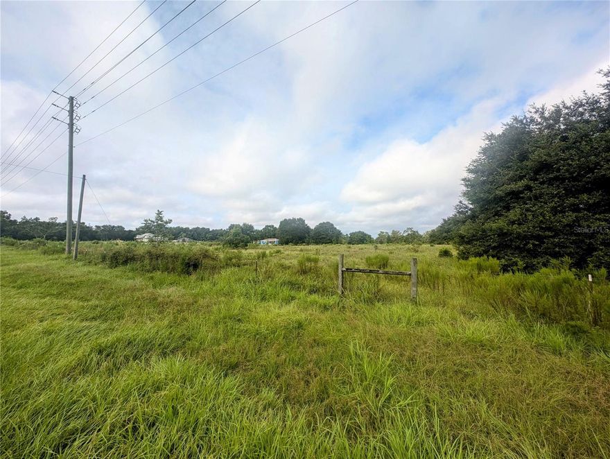This 5-acre lot with a shed, electricity, and a well that is situated just outside SW Gainesville, and is ideally located a mile north of Archer Road and seven miles south of Newberry Road. Enjoy the freedom of no HOA, the ability to keep horses, and ample space for boat and camper parking. Plus, it’s a quick drive to Shands/UFHealth, the University of Florida, supermarkets, shopping, restaurants, and I-75. Bring your builder and turn your dream home into reality! Zoned for Alachua County schools, this property offers the charm of country living with convenient access to city amenities -- this property might just be the one you're looking for.