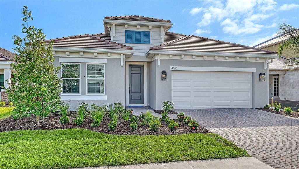 Photo of 8201 Scarletbush Drive, Sarasota, FL 34240 (MLS # A4708020)