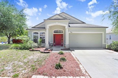 Photo of 6915 Monarch Park Drive, Apollo Beach, FL 33572 (MLS # TB8498774)