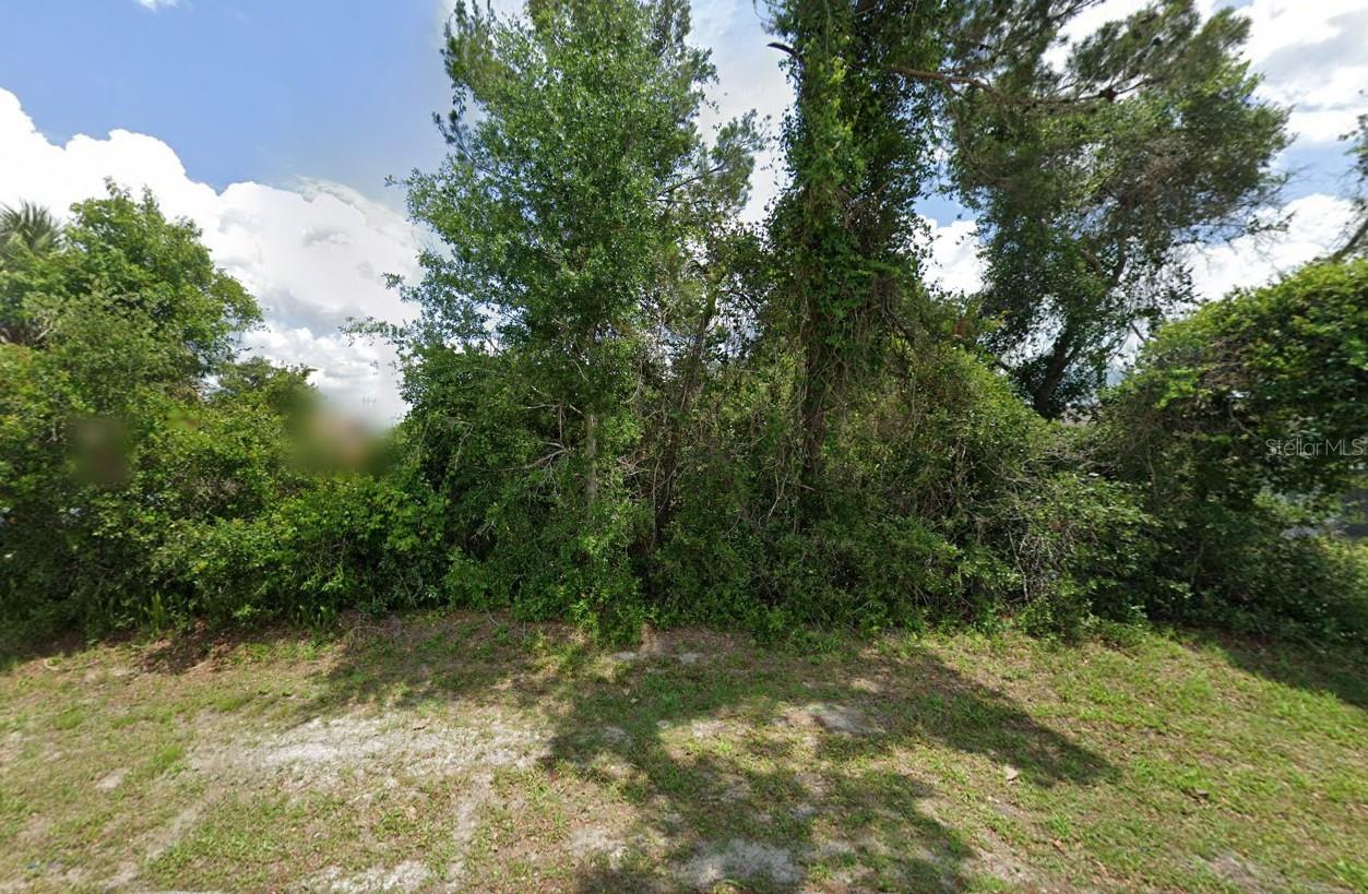 Build your dream home on this spacious 0.24-acre (10,764 sq. ft.) lot located in the heart of Deltona. This residential parcel sits on a paved road with power nearby, offering convenience for future development. With ample space for a custom build, outdoor living, or a pool, this lot is ideal for your vision. Enjoy a peaceful neighborhood setting while still being close to shopping, dining, schools, medical facilities, and major highways. Just a short drive to Orlando, Daytona Beach, and all that Central Florida has to offer. Whether you’re a builder, investor, or future homeowner, this property is a fantastic opportunity in a growing community.