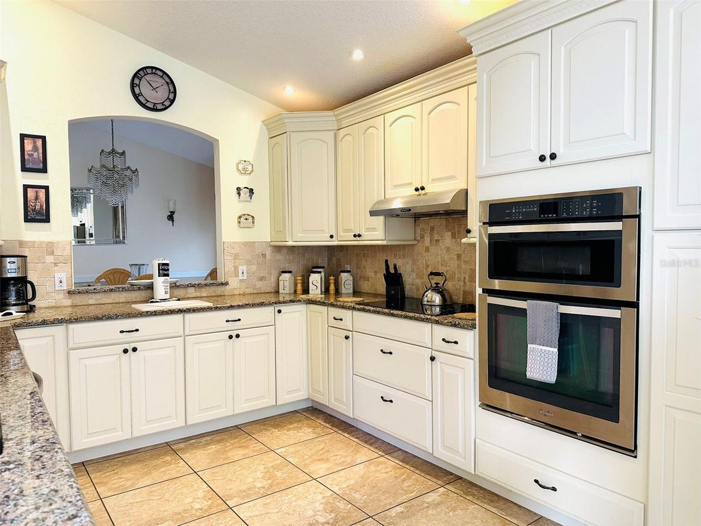 Photo of 1049 Lake Berkley Drive, Kissimmee, FL 34746 (MLS # O6421426)