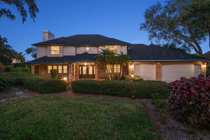 Discover the essence of effortless Belleair living in this expansive two-story residence that combines timeless style with everyday comfort. From the moment you enter through the double doors, you're welcomed into an impressive space designed for both relaxation and memorable gatherings. The home offers an inviting flow that encourages moments shared with family and friends. The first floor hosts a separate guest suite ideal for extended family, visitors, or even a secondary primary bedroom thanks to its size and ensuite bath. The kitchen serves as the true centerpiece of the home—filled with natural light and offering abundant counter space, a huge center island with a gas cooktop, and a breakfast bar that opens to the comfortable family room. Whether preparing everyday meals or cooking alongside friends, this space is made for connection. Formal dinners shine in the elegant dining room adorned with crystal chandeliers, while two fireplaces throughout the home set the stage for intimate evenings. Remote work or hobbies are easy with a dedicated office space and bonus room on second level.  Upstairs, your private retreat awaits—a generous primary suite designed for serenity. Enjoy a spacious walk-in closet, a cozy fireplace, and an indulgent ensuite featuring dual vanities, a walk-in shower, and a soaking tub enhanced by beautiful stained-glass accents. Two additional bedrooms share this level, along with the versatile bonus room that provides access to extra attic storage, creating plenty of room for everyone. Relax and unwind outdoors, with a resort style pool, screened patio areas, and multiple seating areas create your own private resort perfect for dining under the stars or entertaining. Perfectly located close to shopping, dining and the Gulf’s most pristine beaches. More than just a home, this property offers a lifestyle—one filled with charm, comfort, and the unmatched appeal of living in Belleair.