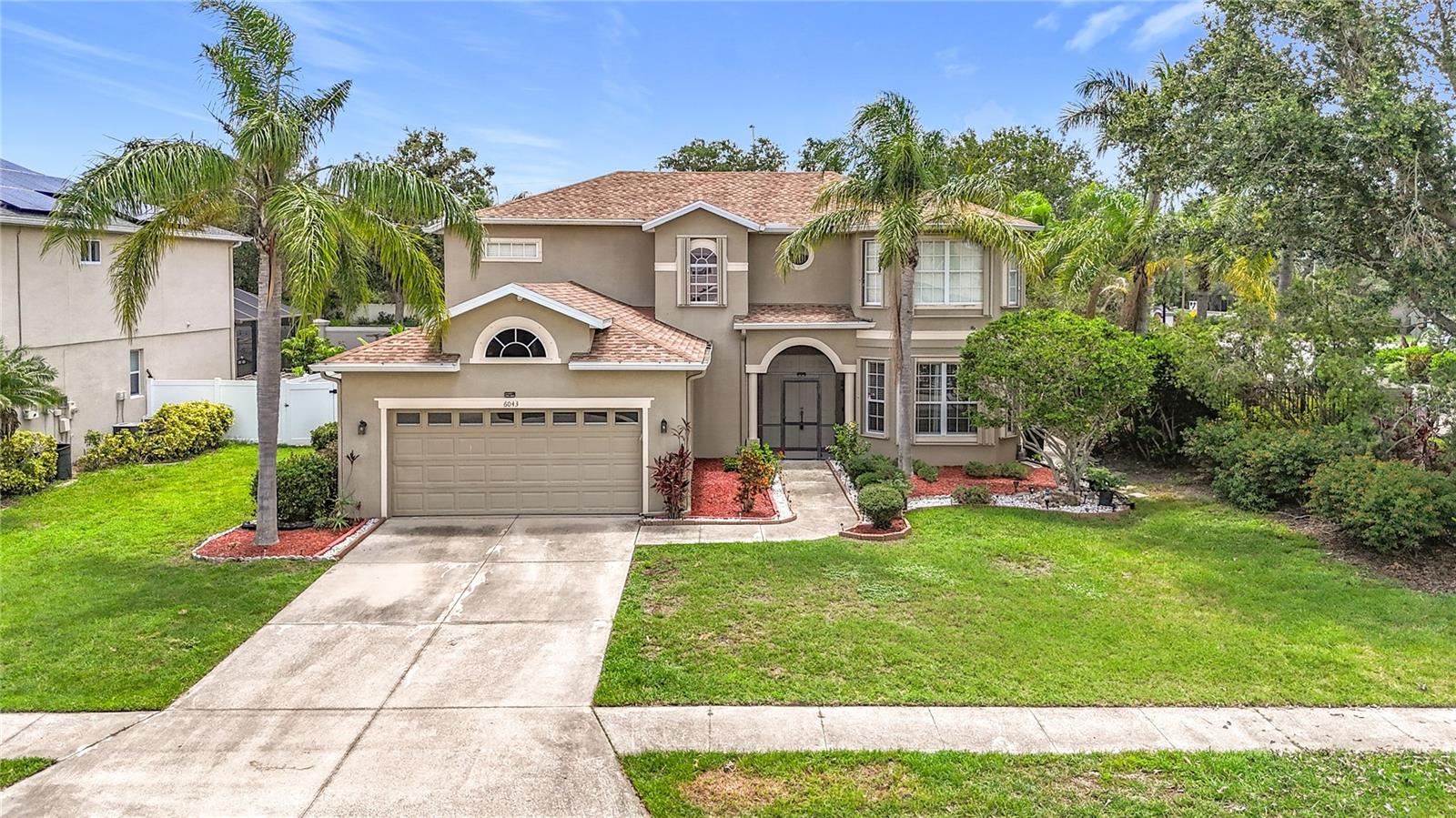 Welcome to this beautifully updated 2-story home offering 2,863 sq. ft. of comfortable living space under air. This spacious resident features 5 bedrooms and 3.5 bathrooms, and a thoughtful layout perfect for families living and entertaining. The primary suite and a bonus room are conveniently located on the main level, featuring elegant laminate flooring for a modern touch and easy upkeep.
Step into the updated kitchen, where you'll find stunning quartz countertops, ample cabinetry, and a bright, functional layout ideal for any home chef. The main floor boasts stylish tile flooring, combining durability and contemporary appeal throughout the living spaces.
Upstairs, you'll find additional well-sized bedrooms and bathrooms, perfect for family & guests.
Step outside into your own private retreat—an expansive backyard filled with fruit trees and a large patio with pavers, offering the perfect setting for gatherings, gardening, or relaxation. The roof is only 3 yrs old. All windows & slider doors are equipped with custom hurricane shutters. Just a slight pull and it closes effortlessly.
Located in a highly desirable area, this home is just minutes away from shopping, dining, and award-winning beaches, blending convenience with the best of coastal living.
Don't miss this rare opportunity to own a beautifully updated home in a prime location!