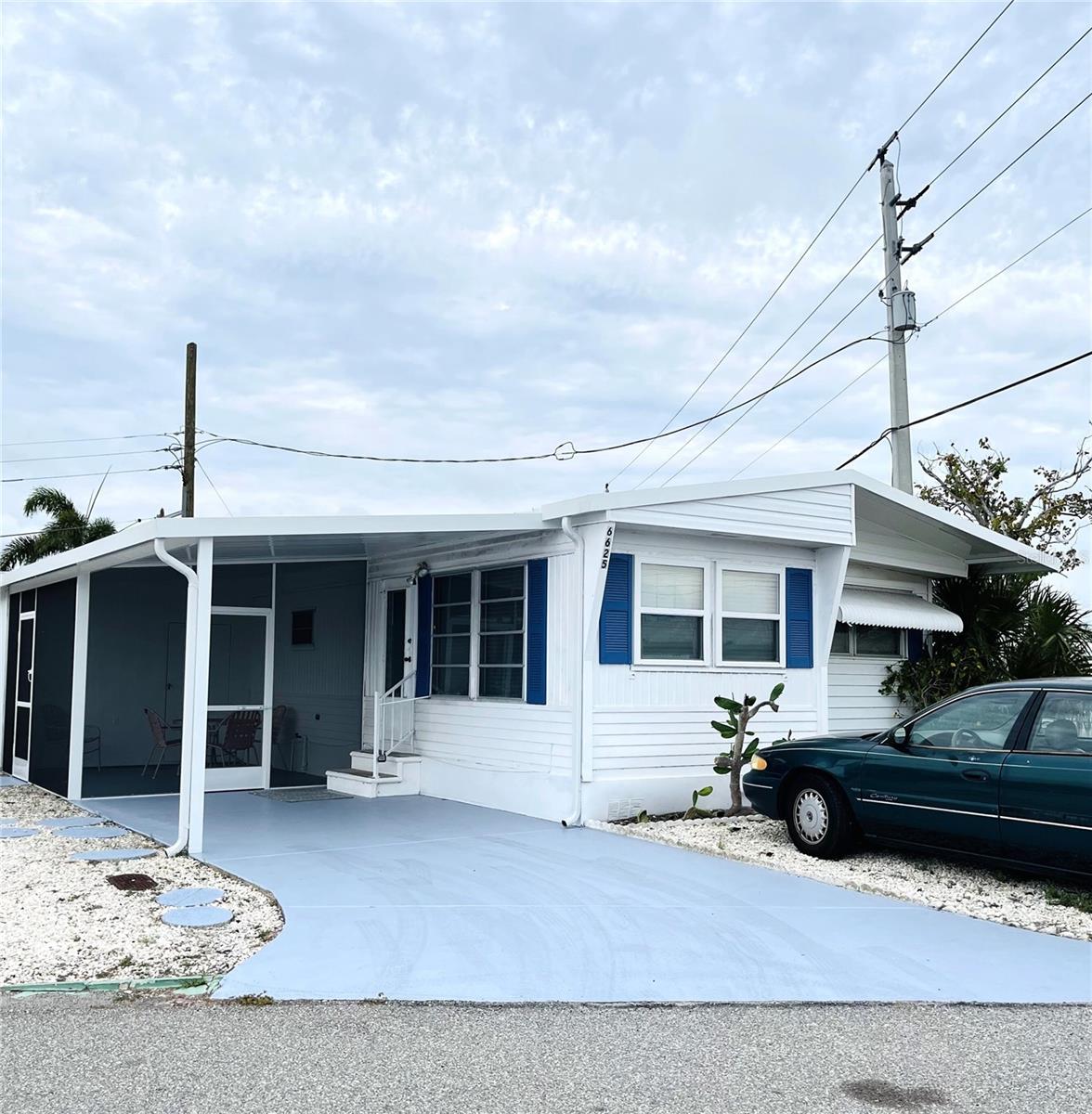 This 2-bedroom, 2-bath home in Trailer Estates 55+ Marina Community features a new roof, new screened room, new carport, and hurricane gutters on the front of the house. Enjoy a propane gas stove and oven, an attached laundry room with a new washer and dryer. Sold fully furnished, it also comes with three TVs and a cozy layout. Outside, enjoy a screened sitting area, an additional outdoor seating space, and your very own orange tree for your coastal lifestyle. A storage shed provides extra space for tools or hobbies.
Located in a Special Parks and Recreation District, this home has no lot rent, CDD, or HOA fees, with an annual park tax covering cable, internet, trash pickup, fire and rescue services, and access to extensive amenities. Residents enjoy a marina with boat slips (as low as $600/year), a private beach, waterfront pavilion, pool, hot tub, fitness center, shuffleboard, bocce ball, and over 60 clubs and social events. Don't miss this opportunity to own a beautifully updated home in one of Sarasota Bay’s most desirable 55+ communities!
All information is subject to verification including square footage and flood map designation.