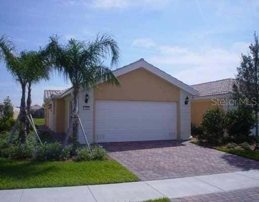 Photo of 11824 Delfina Lane, Orlando, FL 32827 (MLS # O6432737)