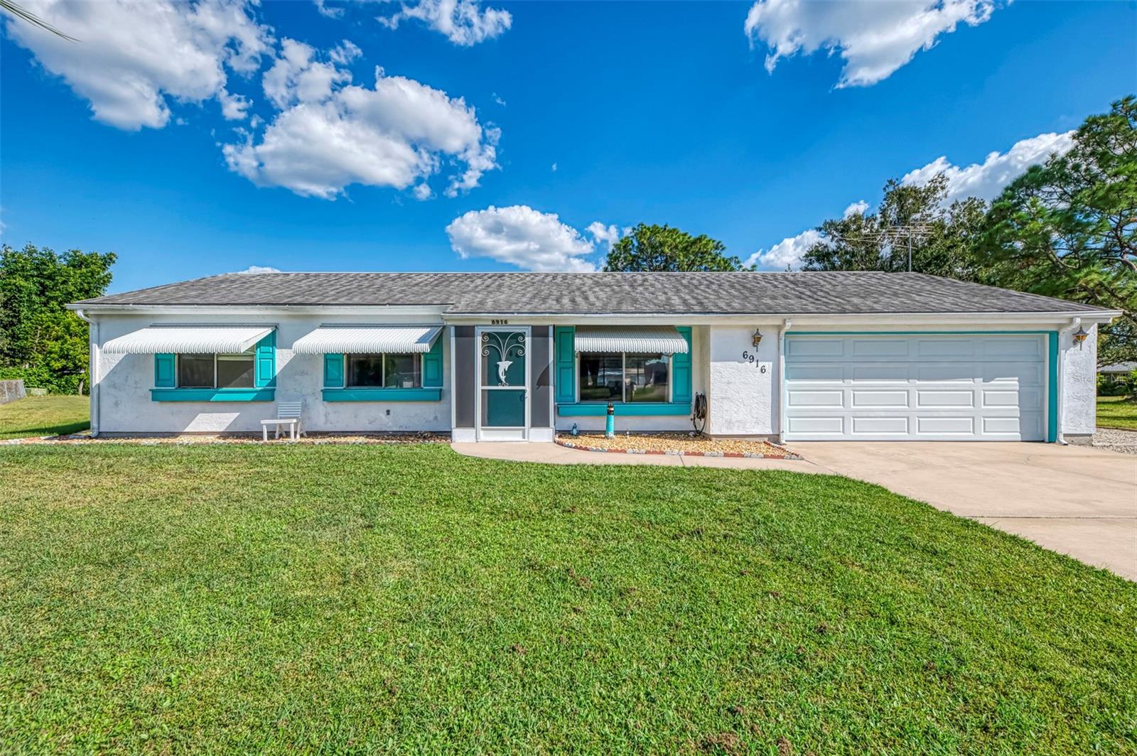 Beautifully updated home on a quiet cul-de-sac in North Port, FL! Located in the desirable Jockey Club community, this 3-bedroom, 2-bath, 2-car garage home offers a wonderful mix of charm, comfort, and practical upgrades. Enjoy low HOA fees with access to a clubhouse, pool, tennis court, and more—all in a peaceful setting that feels tucked away yet close to everything North Port has to offer. Sitting on a pie-shaped oversized lot, this home provides extra space and privacy. There’s even an additional side parking area—perfect for an RV, boat, or other toys—and a large shed for extra storage. The yard has been completely cleared and ready for your personal touch, offering room for gardening, entertaining, or simply relaxing in your own outdoor retreat. Step inside to find coastal-inspired paint colors that create a bright, cheerful atmosphere throughout. The open living and dining area flows effortlessly into the kitchen, which features solid stone countertops with bits of sea glass, soft-close wood cabinetry, recessed lighting, and appliances only four years old. The bonus room adds flexibility for a hobby space, den, or office—whatever suits your lifestyle. Both bathrooms are tastefully designed, with the primary bath offering a walk-in shower and the guest bath featuring a tub/shower combo. The indoor laundry area is conveniently tucked away in a storage closet for a clean, uncluttered look. Flooring throughout is laminate for easy maintenance, with tile in both bathrooms. Step into the screened lanai with vinyl windows, making it a year-round space to enjoy the Florida sunshine. There’s also a screened front porch that allows a pleasant cross-breeze during cooler months. This home has been meticulously maintained with big-ticket updates already done for you: Roof (2018), New AC (2024) with all new ductwork and a 12-year parts and labor warranty, Replaced electric panel (2020) with updated outlets and plugs, New hurricane-rated garage door, Metal clamshells over windows that double as awnings and hurricane protection, City water and sewer with an under-sink reverse osmosis system, Partially furnished for added convenience. The garage offers extensive built-in cabinetry along all walls while still leaving room to park your car. This North Port gem combines comfort, quality, and peace of mind in one incredible package. With thoughtful upgrades, a spacious layout, and access to community amenities, this home truly stands out. Schedule your private showing today and see all that this beautiful property has to offer!
