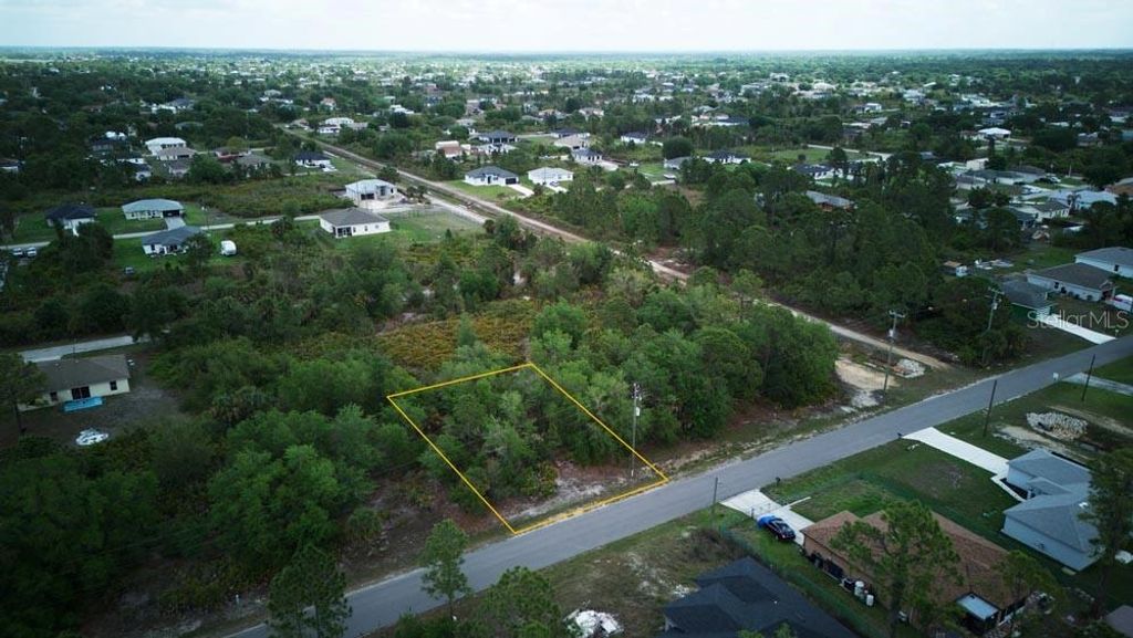 Photo of 3104 51st Street W, Lehigh Acres, FL 33971 (MLS # OM722397)