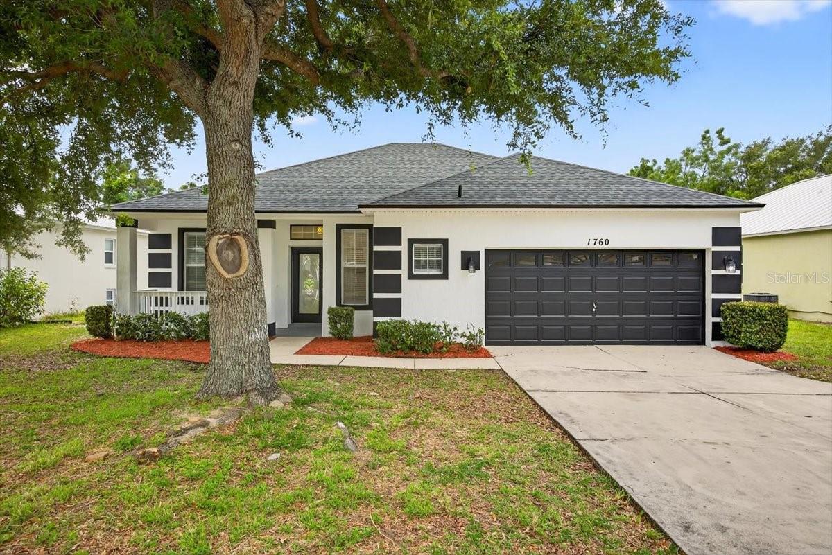 One or more photo(s) has been virtually staged. Welcome home to this newly remodeled 3 bedroom and 2 full bath home in the desired subdivision of 'Overlook at Mount Dora'. This property has modern touches from an open design with new luxury vinyl sand oak flooring throughout the house to give it a breath of fresh air. The home features a BRAND NEW roof and HVAC that was installed (HVAC will be fully installed 04/20/2025). From new stainless steal appliances, new light fixtures, new ceiling fans and a fresh light color of paint on the interior and exterior, you truly cant find a more beautiful home at this price point. Enjoy a dedicated breakfast nook and dining area with an open lay out to the living room. The primary bedroom has en-suite when double sinks and a walk in closet. Located in a prime location near shopping centers, golf courses, recreational areas and near major highways; This home offers a perfect mix of convenience and activities. Book your showing today, this home is priced to sell and easy to show!