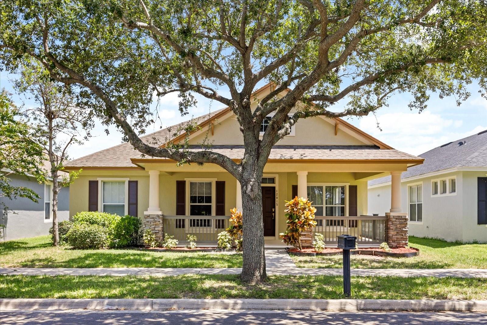 This beautiful 3 bedroom, 2 bath home is nestled in the highly desirable Lakes of Windermere community, offering resort-style amenities. Enter the home to a split-bedroom floor plan with a formal living and dining space at the entryway, a family room following the kitchen, and a bonus room perfect for an office, play room, or home gym. The kitchen is equipped with ample cabinet space, granite countertops, a stunning herringbone backsplash, a pantry, and a breakfast bar seating area. The primary bedroom features a walk-in closet and en-suite bathroom with two vanities, a relaxing garden tub, and a separate walk-in shower. The two remaining bedrooms share a guest bathroom with a spacious vanity, bathtub, and linen closet. Additional upgrades include an indoor laundry room with built-in cabinets and closet organizer systems in all bedrooms. Step outside to a private, fully fenced backyard with a covered and screened patio providing space for an outdoor dining set or lounge area. This home also features a spacious front porch, ideal for enjoying the community pond and fountain, which is illuminated at nights. RECENT RENOVATIONS include new LVP flooring at the entryway and hallways, new carpet in the bedrooms, and fresh interior & exterior paint. The A/C is only 4 years old. The Lakes of Windermere community offers a plethora of amenities including a swimming pool, 3 playgrounds, picnic tables, a gazebo at Pine Loop Park, volleyball, basketball, and tennis courts, and a relaxing fishing pier overlooking Lake Sawyer. Conveniently located near highly rated (A+) public schools and Windermere Town Square. Windermere offers a wide range of grocery stores, restaurants, shops, parks, golf courses, and a weekly farmer’s market. ONLY 15 MINUTES TO DISNEY WORLD AND 30 MINUTES TO UNIVERSAL STUDIOS. Submit your offer today!