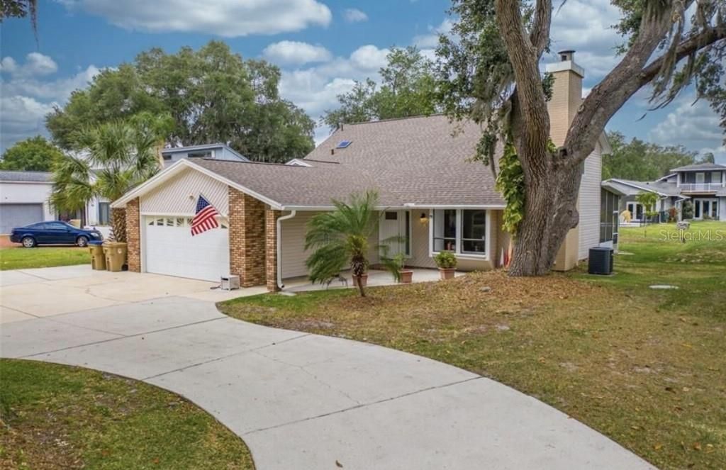 Photo of 1595 Shady Oak Drive, Kissimmee, FL 34744 (MLS # TB8467744)