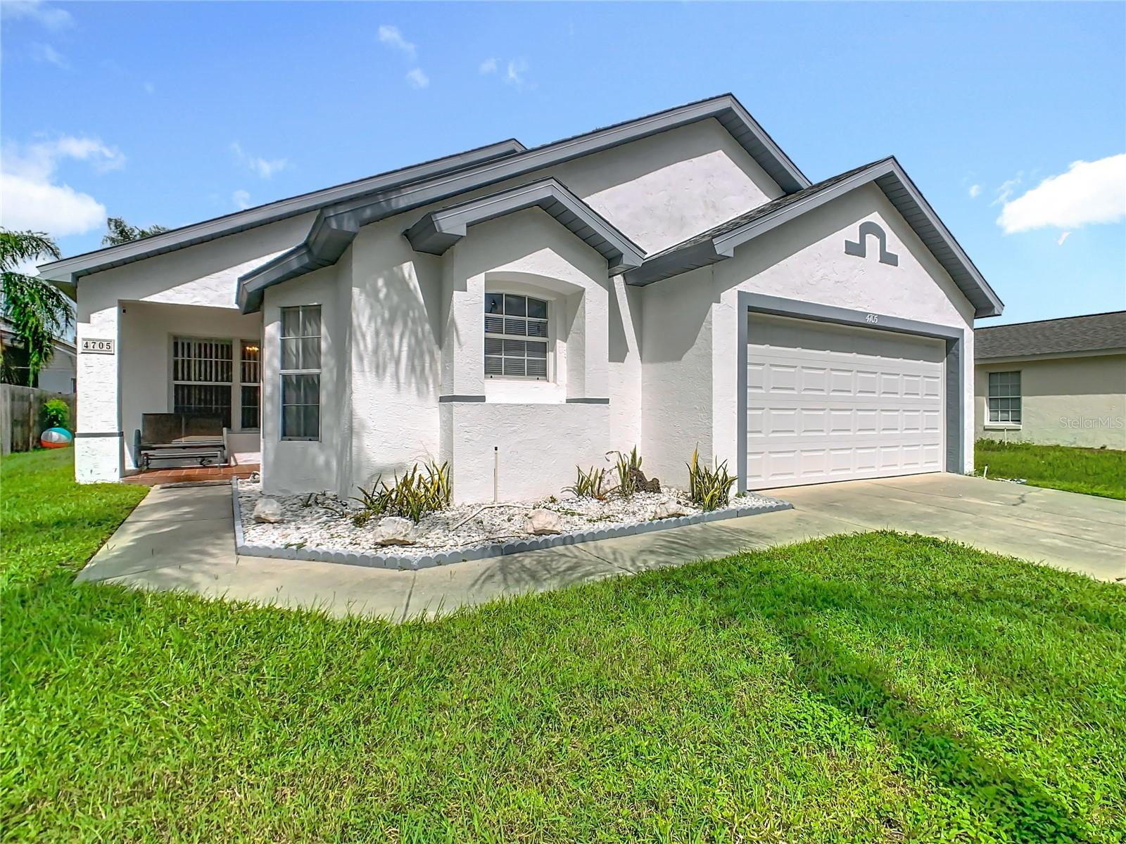 This beautifully maintained 4-bedroom, 2-bath pool home offers the perfect blend of comfort, style, and flexibility. Whether you’re looking for a primary residence, vacation retreat, or income-producing property, this home checks all the boxes. Step inside and you’ll immediately notice the brand-new kitchen, complete with granite countertops, stainless steel appliances, and modern finishes that make cooking and entertaining a joy. The spacious, open layout flows seamlessly to the large screened-in back patio, where you’ll find a sparkling private pool—also fully screened for year-round enjoyment. The furnished interior provides a move-in-ready experience, ideal for those looking to maximize the property’s short-term rental zoning or simply settle in with ease. The primary suite is a true retreat, featuring a generous walk-in closet and a luxurious bathroom with dual sinks, a soaking tub, and a separate shower. Additional highlights include: Three well-sized guest bedrooms offering space for family or guests, two full bathrooms for convenience and privacy, open living and dining spaces designed for entertaining, and a furnished, turnkey opportunity ready for personal or rental use. Located in Kissimmee, this home puts you close to shopping, dining, and world-class attractions—making it an excellent choice for both lifestyle and investment. Don’t miss the chance to own this versatile, poolside paradise!