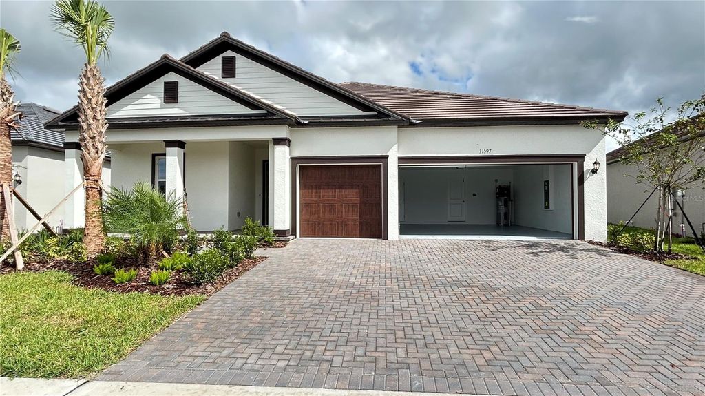 Photo of 31597 Griffin Sands Lane, San Antonio, FL 33576 (MLS # J994447)