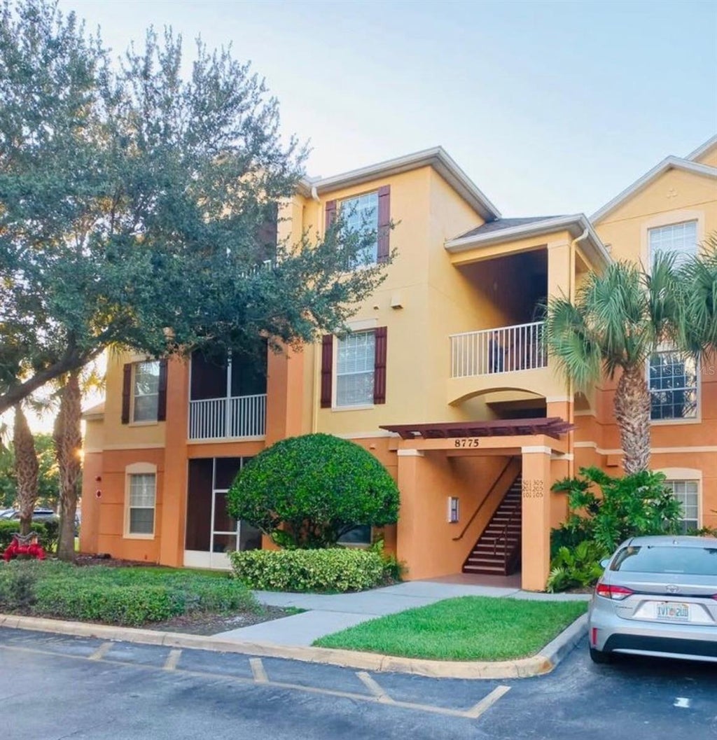Photo of 8775 Sartori Street #301, Orlando, FL 32829 (MLS # O6437563)