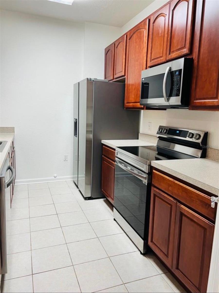 Photo of 8775 Sartori Street #301, Orlando, FL 32829 (MLS # O6437563)