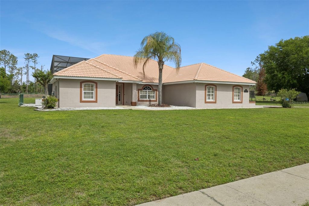 Photo of 7833 Golf Paradise Way, Clermont, FL 34711 (MLS # O6396447)