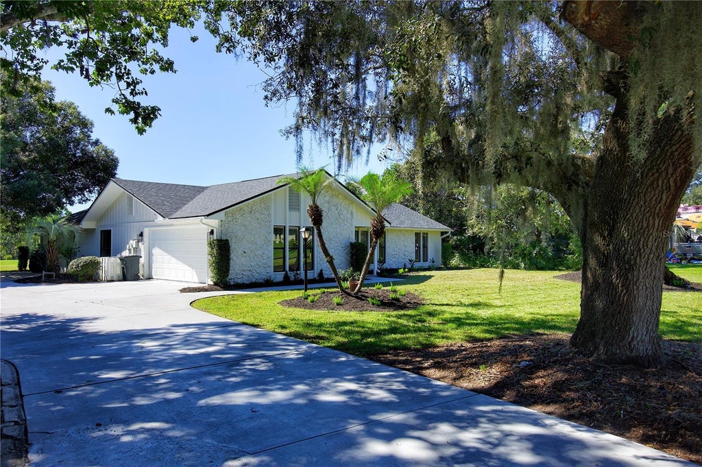 Photo of 1074 Club House Boulevard, New Smyrna Beach, FL 32168 (MLS # NS1089463)