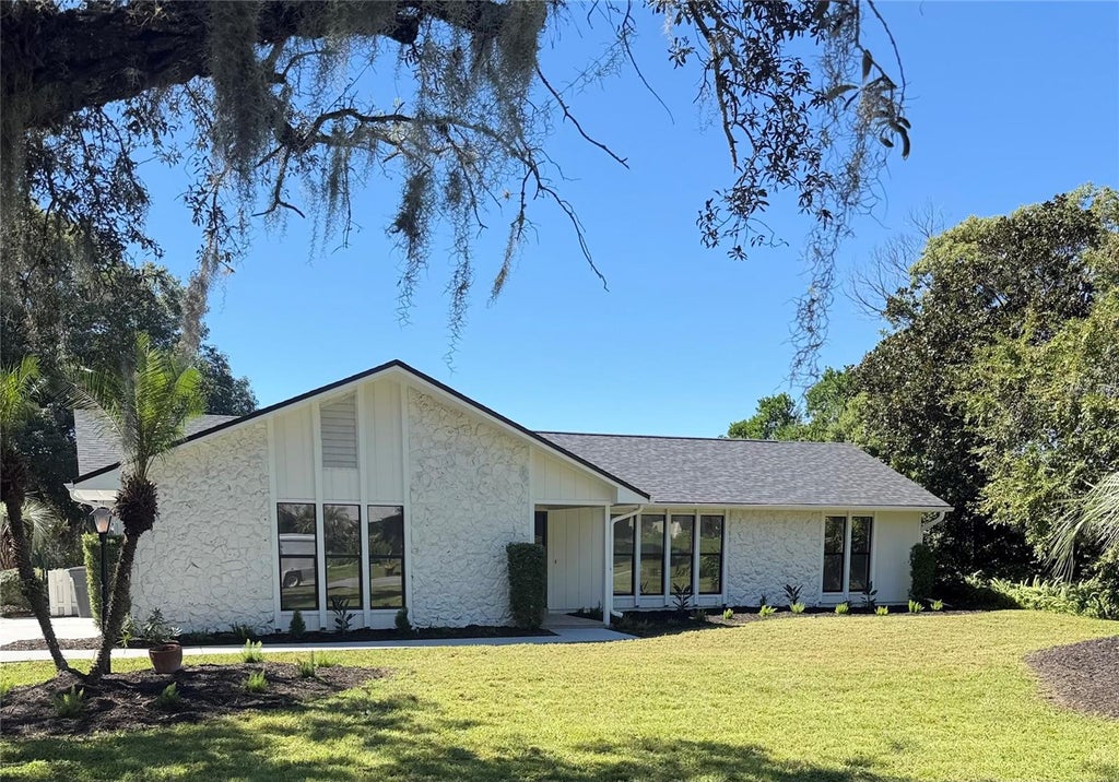 Photo of 1074 Club House Boulevard, New Smyrna Beach, FL 32168 (MLS # NS1089463)