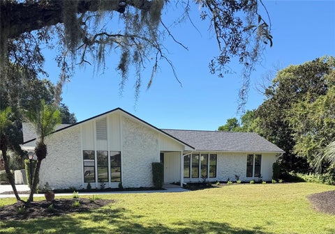 Photo of 1074 Club House Boulevard, New Smyrna Beach, FL 32168 (MLS # NS1089463)