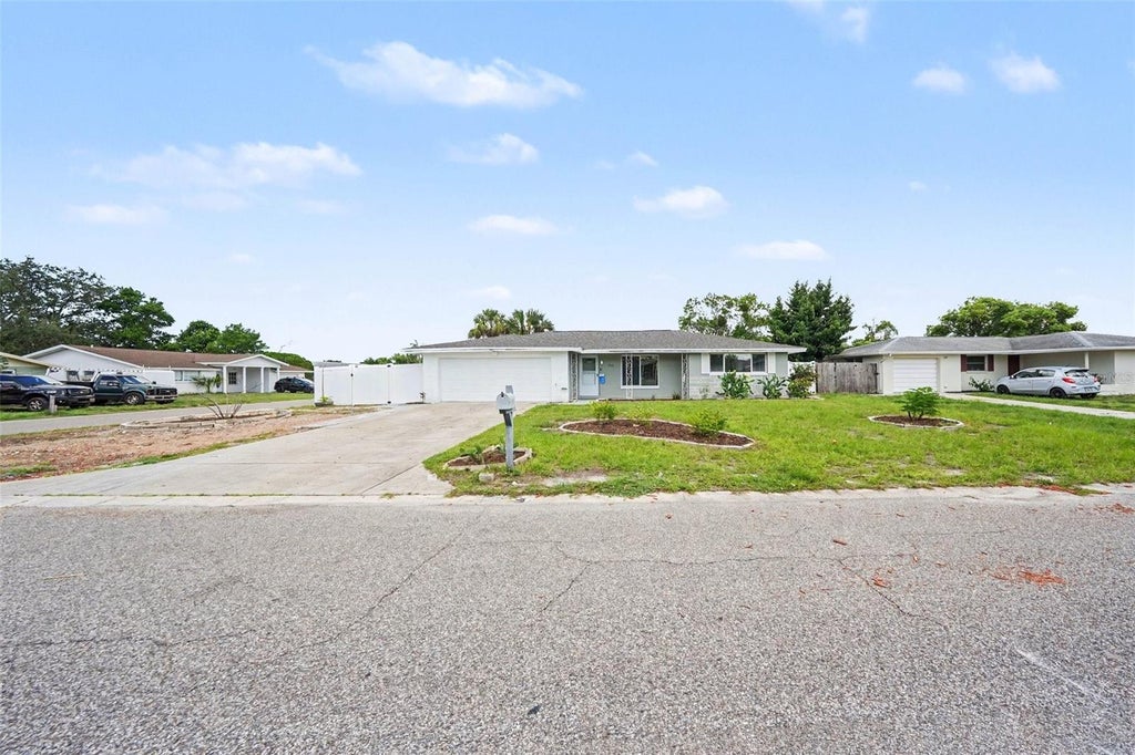 Photo of 7815 Monarda Drive, Port Richey, FL 34668 (MLS # TB8545455)