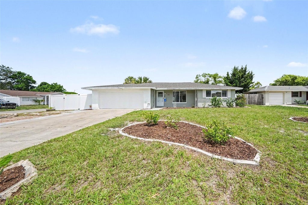 Photo of 7815 Monarda Drive, Port Richey, FL 34668 (MLS # TB8545455)