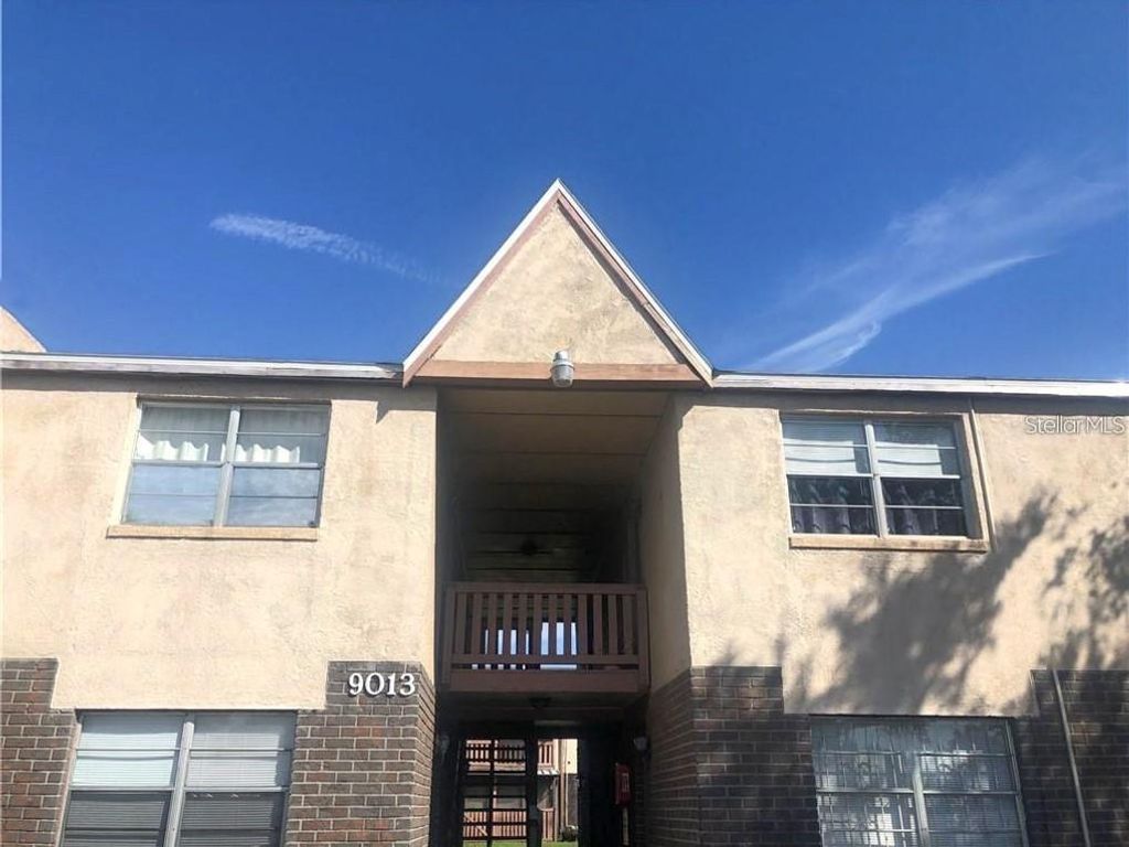 Photo of 9013 Westchester Circle #29 APT E, Tampa, FL 33604 (MLS # S5149465)