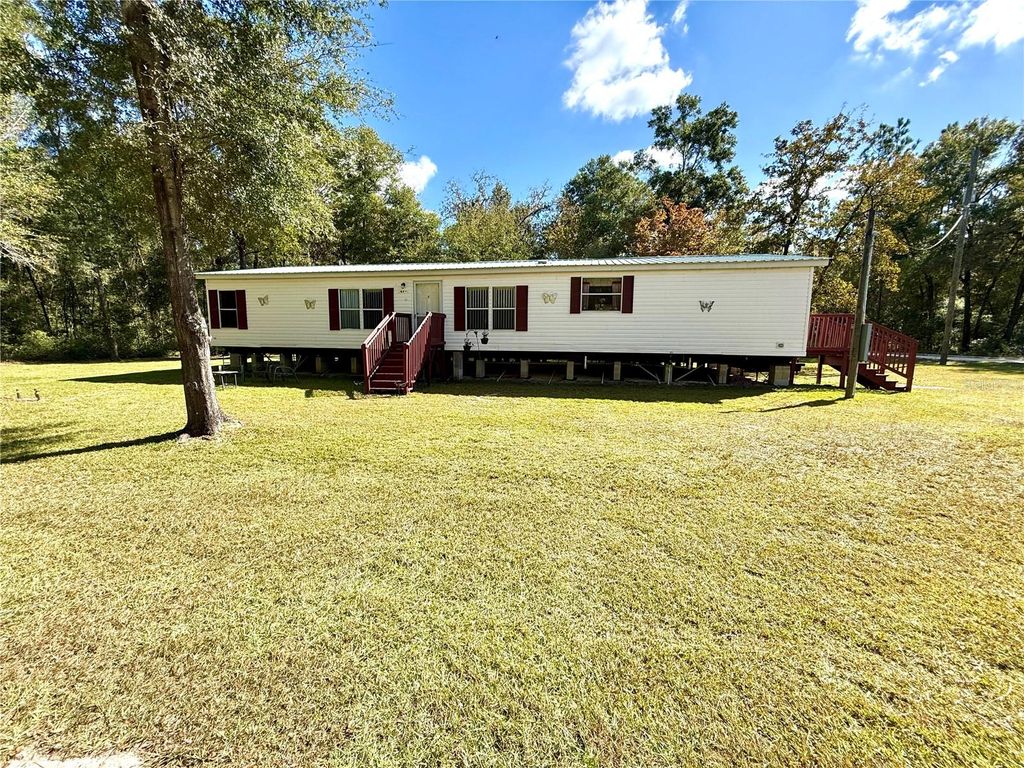 Photo of 15441 NE 2nd Place, Williston, FL 32696 (MLS # GC534850)