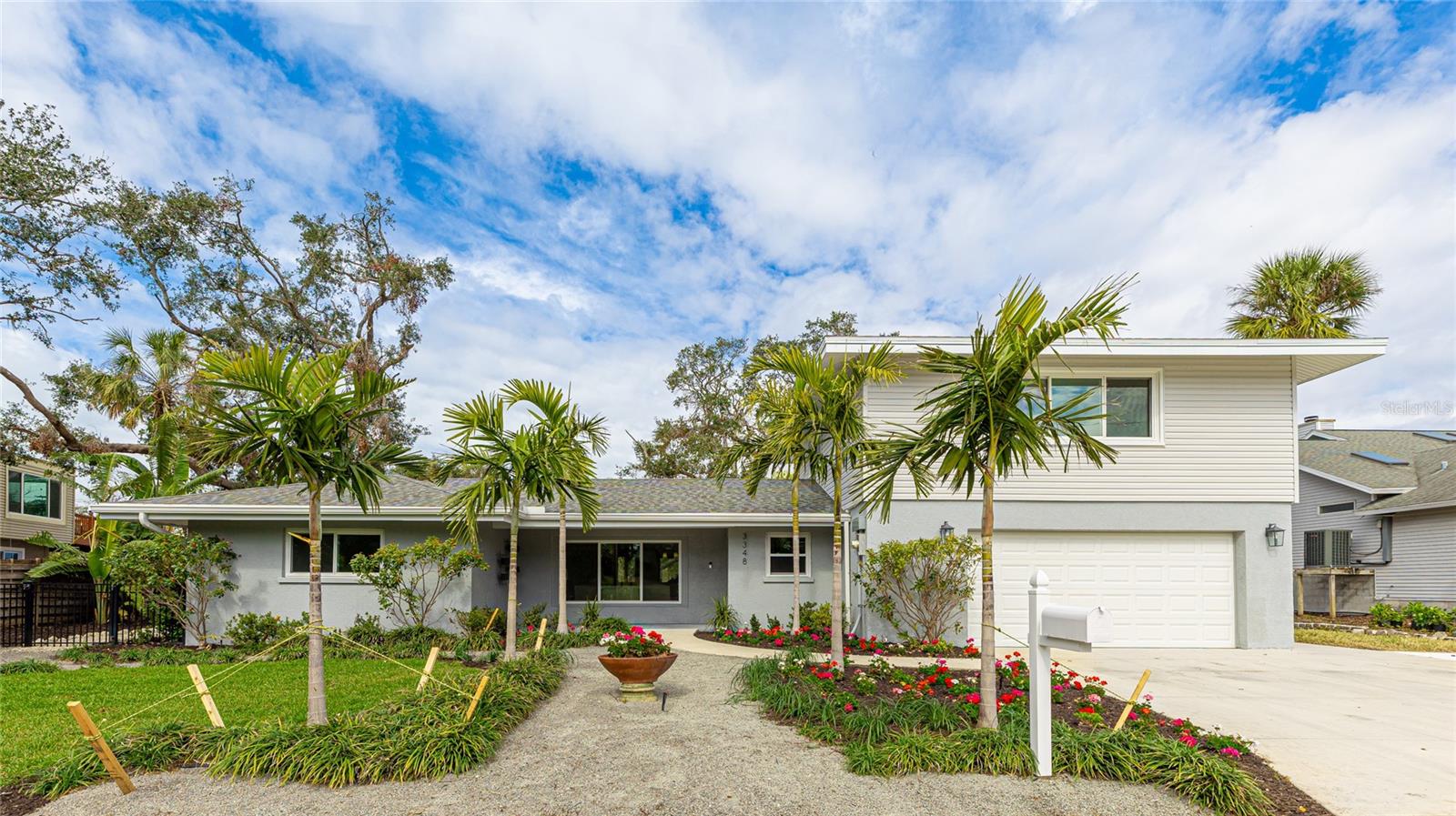 One or more photo(s) has been virtually staged. Welcome to 3348 S Seclusion Drive, an impeccably renovated gem located in the heart of Sarasota's highly sought-after Southgate community. Over the past four years, this stunning property has undergone a complete transformation, with thoughtful updates inside and out, ensuring a modern and move-in-ready experience for its next owner.
This spacious 2,700-square-foot home features 4 bedrooms and 3 bathrooms, offering a versatile layout perfect for families, entertainers, or those seeking a stylish lifestyle. From the moment you arrive, you'll be captivated by this home's undeniable charm. The pristine curb appeal, lush landscaping, and inviting exterior create a warm and welcoming first impression.
Inside, the open and airy floor plan is flooded with natural light, creating a bright and welcoming atmosphere throughout the home. Beautiful luxury vinyl plank floors flow seamlessly through every room, enhancing the warmth and elegance of the space. The spacious living and dining room, ideal for hosting guests or enjoying everyday life in style, features sliding glass doors that open directly to the backyard, blending indoor and outdoor living effortlessly.
The luxury kitchen is a showstopper, featuring vaulted beamed ceilings that add a touch of architectural elegance. With sleek white countertops, matching cabinetry, and all-new stainless steel appliances, this space is as stylish as it is functional—perfect for both casual meals and gourmet cooking.
The primary suite is conveniently located on the first floor, offering direct access to the backyard and providing a private retreat to relax and enjoy the outdoors. This spacious, oversized bedroom includes his and hers closets and a beautifully designed en suite bathroom. Also on the first floor is the second bedroom and a full bathroom, offering flexibility for guests, family members, or a home office.
Upstairs, the third and fourth bedrooms, along with a third full bathroom, provide a private and comfortable space perfect for children, guests, or additional living quarters. The fourth bedroom is large enough to accommodate multiple beds or could easily be transformed into a game room, offering versatility for a variety of needs.
The interior is as good as it gets, but the outside is where Florida Living is made. Step into the large fenced-in backyard, where you'll find a beautiful pergola, perfect for al fresco dining, entertaining, or simply unwinding in your private outdoor oasis. The expansive yard offers ample space for activities, gardening, or even future customizations to suit your lifestyle..
Conveniently situated in the desirable Southgate community, known for its central location and top-tier school zones, this home is just a short distance from Siesta Key's world-renowned beaches, downtown Sarasota's vibrant cultural scene, grocery stores, and a variety of shopping and dining options. This property truly offers the best of both convenience and lifestyle.
Don’t miss this incredible opportunity to own a completely updated home in one of Sarasota’s most desirable locations.