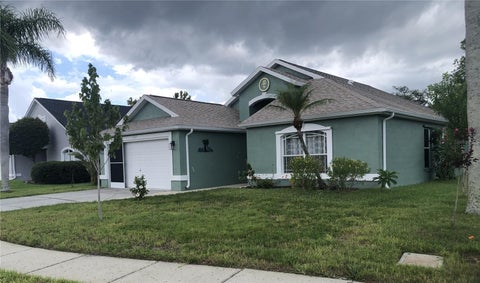 Photo of 10125 Peoples Loop, Port Richey, FL 34668 (MLS # W7887320)