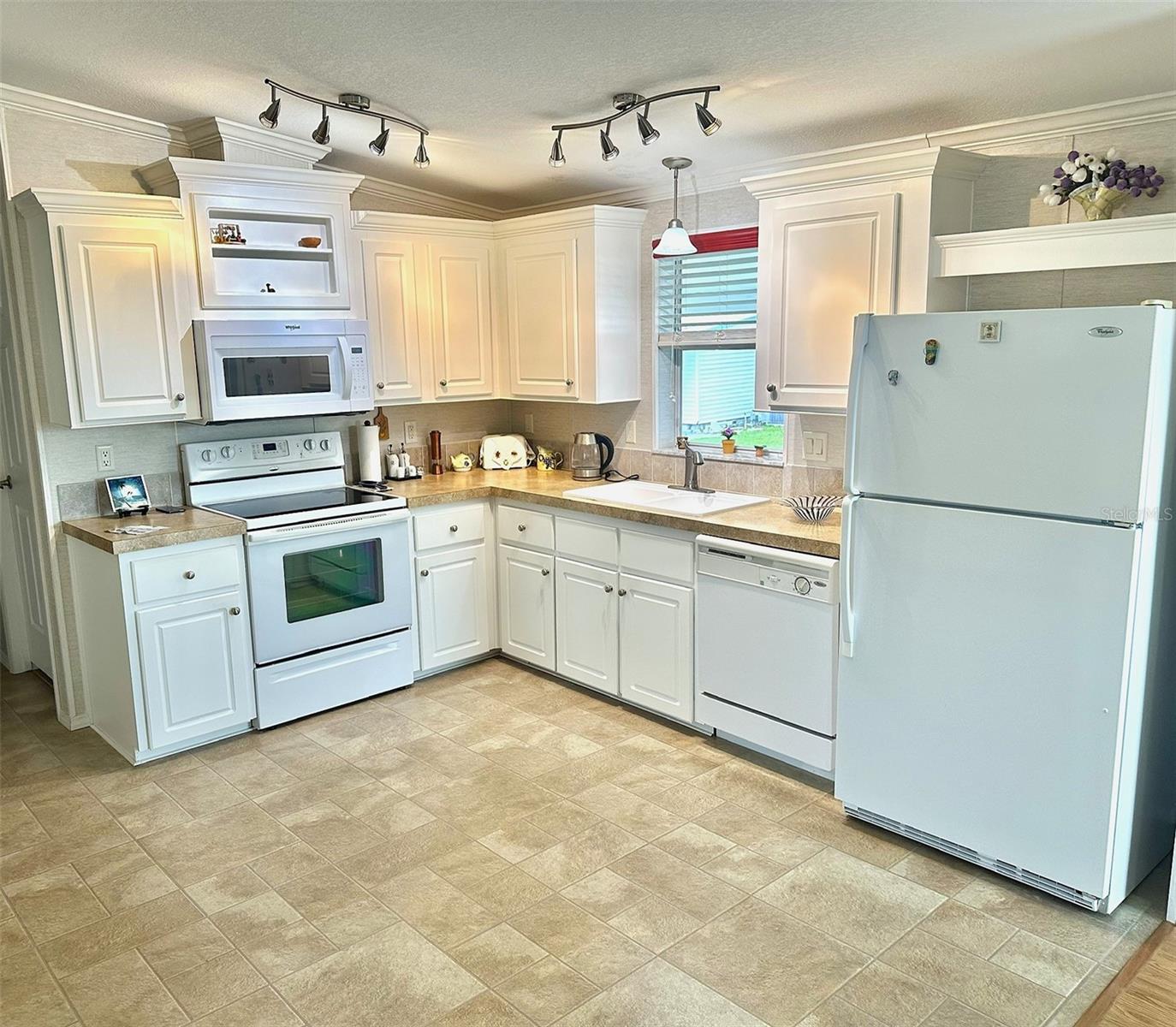 9790 66TH STREET N 200