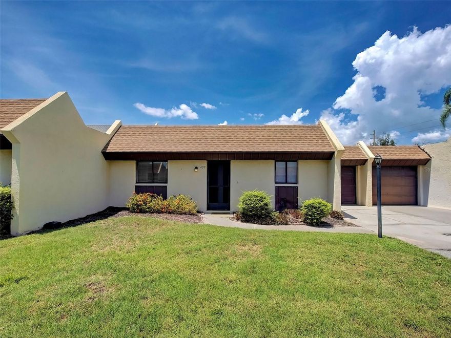 One or more photo(s) has been virtually staged. Charming Venice Villa – Prime Central Location! Welcome to Las Casas, a highly desirable and quaint community perfectly positioned for the ultimate Florida lifestyle. This sweet 2-bedroom, 2-bathroom villa features over 1,000 sq. ft. of bright, open living space and an attached 1-car garage. The heart of the home is an inviting kitchen that opens seamlessly to the living area. Large sliding glass doors lead out to your private, covered lanai—the perfect spot for morning coffee or evening lounging, located just steps away from the sparkling community pool. The primary suite offers ample closet space and a private en-suite bath with a tub/shower combination. The second bedroom is nicely tucked away near the guest bath, which also features a tub/shower setup. Added conveniences include an in-unit stacked washer and dryer. Located just minutes from historic Downtown Venice Island, pristine Gulf beaches, premier shopping, and dining. Commuters will love the quick, easy access to I-75 and the new Sarasota Memorial Hospital in Nokomis. Looking for an investment? If you LOVE this villa, the owner may have others for sale soon in the same community!