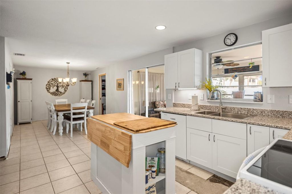 Photo of 54 Nicholas Drive, Dunedin, FL 34698 (MLS # TB8460044)