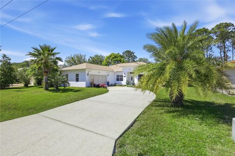 Photo of 43 Flemingwood Lane, Palm Coast, FL 32137 (MLS # FC317762)