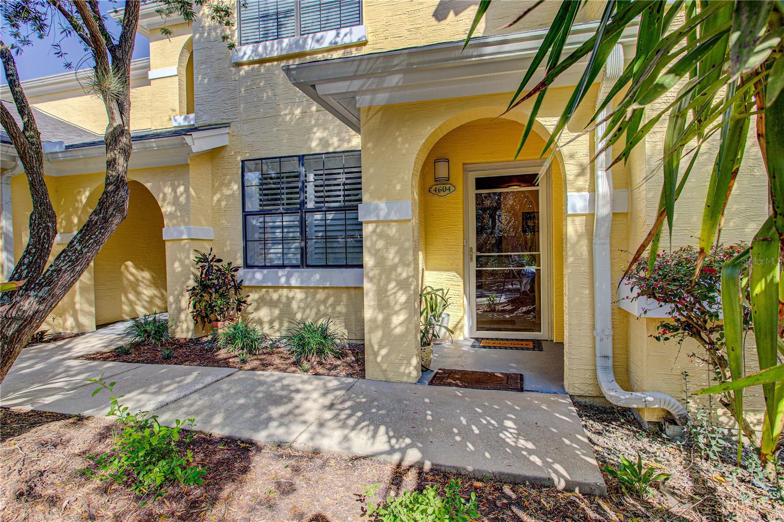 Enjoy the Florida lifestyle in this ground-floor condo with a private garage—perfectly located in a scenic riverfront community in historic St. Augustine! Step into a spacious living area with durable vinyl flooring that flows into a screened-in patio—your own retreat with peaceful water views. The smart split-bedroom layout offers privacy for guests, and there's ample storage throughout. This vibrant community offers resort-style amenities including sparkling pools, a modern fitness center, a clubhouse, security gate, RV parking, car wash station, and breathtaking nature trails along the St. Sebastian River. Located just minutes from the enchanting charm of downtown St. Augustine, Vilano Beach, stunning coastal escapes, premier outlet shopping, and an array of fantastic dining options, this home places you at the heart of it all. Don't miss your opportunity to experience the best of Northeast Florida—schedule your showing today!