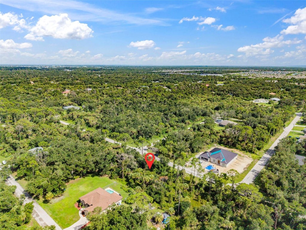 Photo of 16070 Tarkio Avenue, Port Charlotte, FL 33954 (MLS # C7529223)