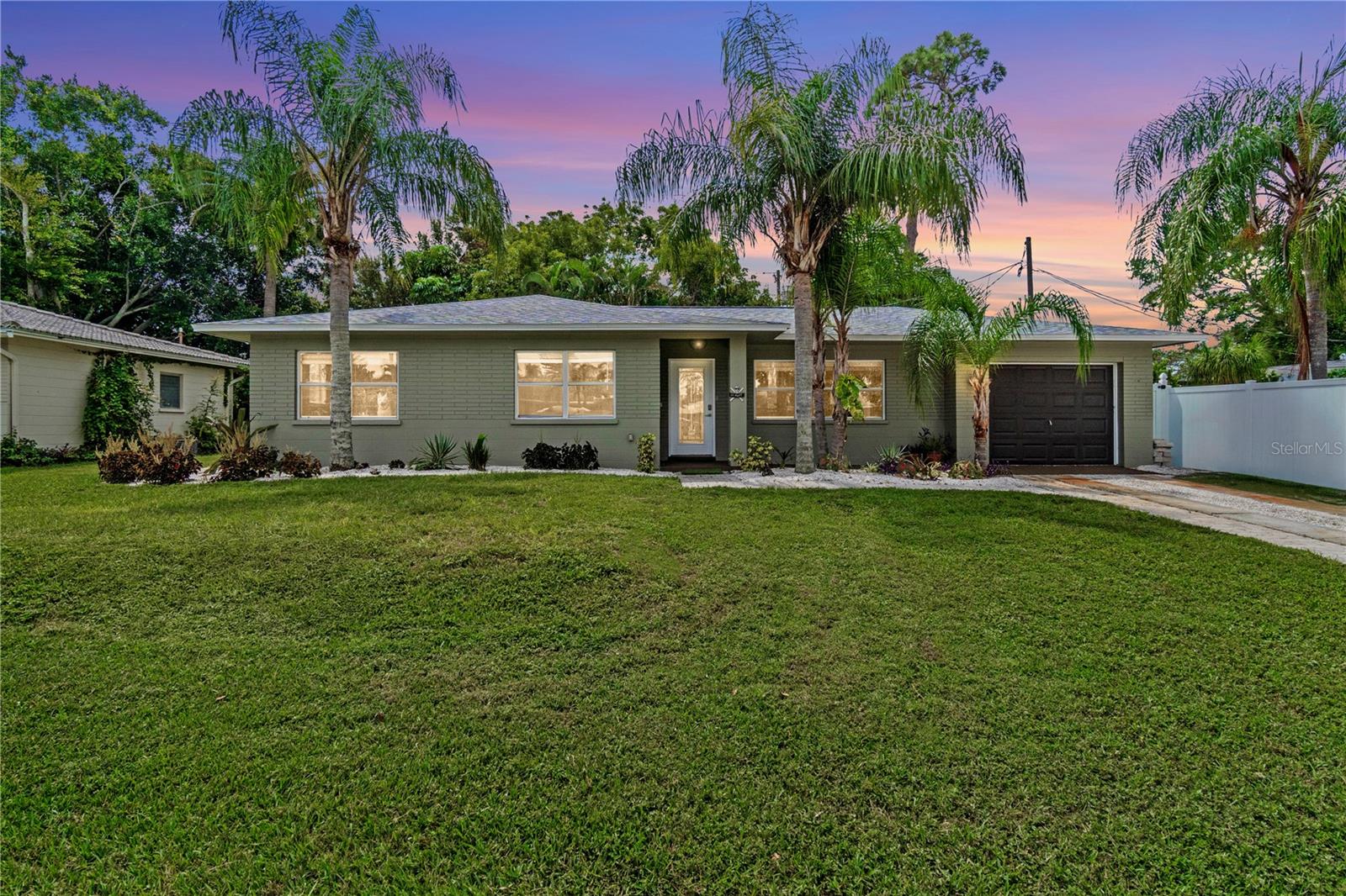 Welcome to Bay Pines Estates in St. Petersburg, Florida!
This beautifully maintained 3 bedroom, 2 bathroom home offers the best of Florida living with an open floor plan and a spacious great room that’s perfect for entertaining family and friends.
The heart of the home flows seamlessly into the outdoor living space, where you’ll find a huge covered lanai large enough for dining, lounging, and enjoying evenings by the grill. The lanai is designed for comfort and fun, with room for a TV and plenty of seating.
Step into the backyard and discover a true retreat! The yard has been fully turfed for easy maintenance and features a putting green, a tranquil koi pond, and lush tropical landscaping. An outdoor shower/pet washing station adds extra convenience, while the detached storage shed with power offers space for hobbies, tools, or a workshop.
For boaters, this home is ideally located close to private and public boat ramps, with plenty of space in the driveway to park your boat trailer. Just minutes from Gulf beaches, shopping, dining, and entertainment, this home places you in the heart of St. Petersburg’s best offerings.
Whether you’re hosting gatherings in the oversized great room, relaxing on the lanai, or enjoying the backyard oasis, this Bay Pines Estates home is built for both comfort and lifestyle.
Don’t miss your chance to own this St. Petersburg gem—schedule your showing today!