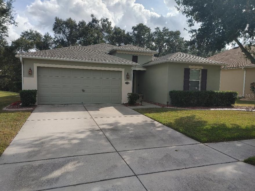 55 PLUS GATED GOLF COMMUNITY! Welcome to your new home...
This meticulously maintained three-bedroom two-bath block home is located in an exceptionally well kept gated and guarded golf course community. The home features an open concept design with a detailed eye on the kitchen with its stone counter tops, dual built in ovens including a convection oven, gas range top, built in microwave and a sit-down Island. The cabinets are ample and upgraded from standard there is expansive stone counter space for your cooking pleasure, a stone and tile backsplash and ample outlets! There is tile throughout the open living space, the 18x24 great room has a natural flow to the expanded 20X40 screened and partially covered rear porch which boasts your private spa and ceiling fans. The master suite has tall 9' ceilings with dual walk-in closets. The master bath sports a dual sink vanity with a stone top. There is a private privy and a walk-in shower. The separate laundry/mudroom leading to the two-car garage is well designed and functional. The garage has built in storage racks mounted to the ceiling, and a 220 outlet for your electric car. This home is well optioned and ready to move into.