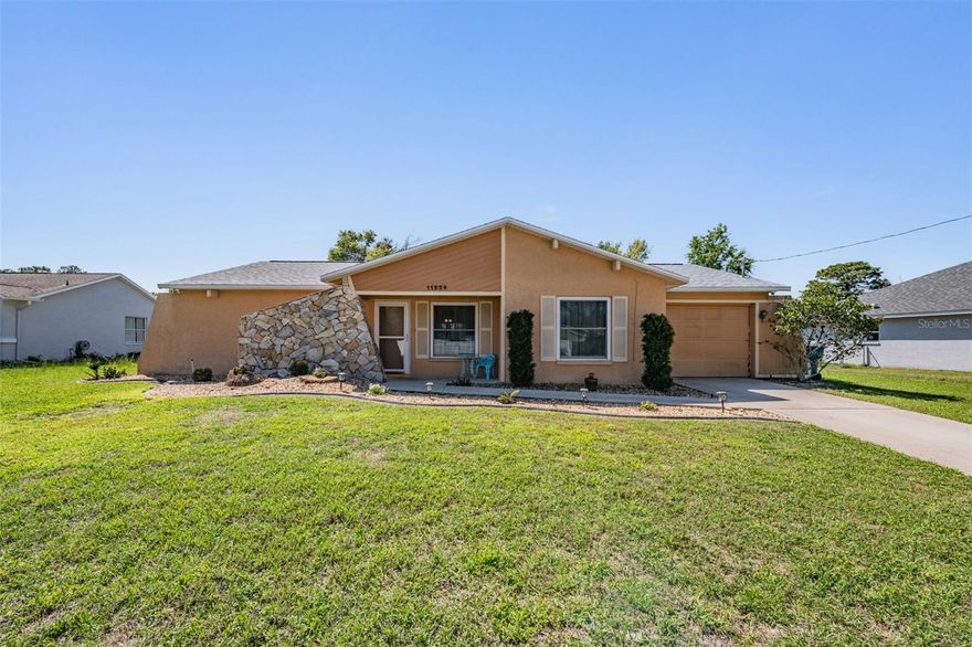 Welcome to this beautifully maintained 2-bedroom, 2-bath home with a 1-car garage, offering comfort, flexibility, and true Florida-style living. Stepping inside your new home to a freshly painted updated look that’s truly move-in ready.  NO HOA fees and Non-Flood Zone for peace of mind.  The bedrooms, living room, and family room are spacious—with the potential to convert the dinning/living space into a third bedroom or simply utilize as a flex room.  The kitchen features stainless steel appliances and tile flooring, flowing seamlessly into the dining area with sliding glass doors that open to a screened lanai—perfect for indoor-outdoor entertaining. Enjoy your own private backyard oasis with a stunning 30x15 in-ground pool (8 ft deep).  The home is surrounded by a fully fenced yard with a 6-zone irrigation system.  Additional upgrades include New irrigation (2026) newer Tankless Water heater (2025) Newer Fridge/Dishwasher (2024) New Roof installed (2022).  Privacy Fence (2021) Vinyl and Carpet  (2018)  Don’t miss your chance to make it yours!  This is one of the best values in Spring Hill—offering a well-maintained home with a large pool, living space, and private fenced yard, all at a price point where most homes don’t come close to matching these features.”